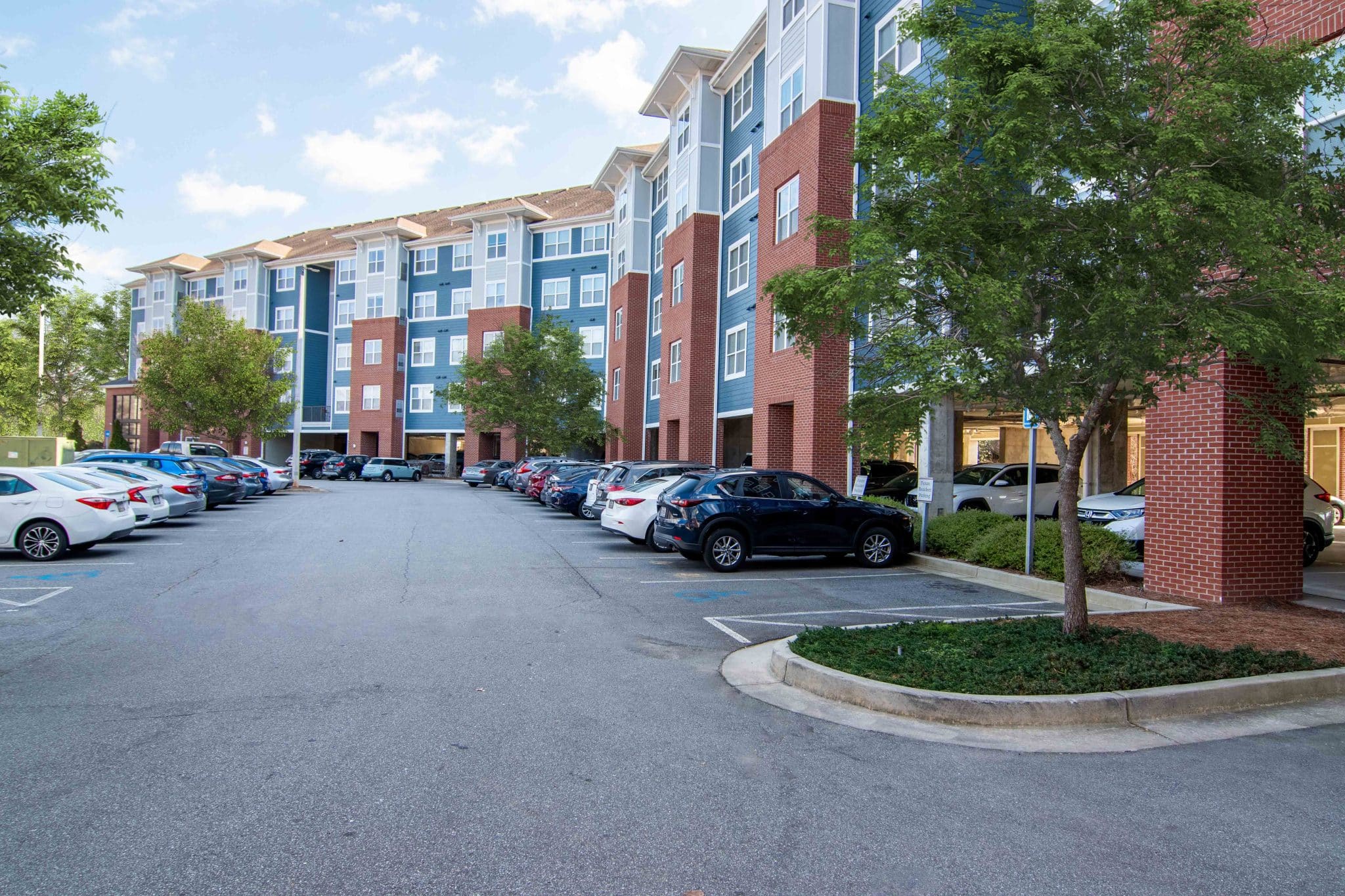 the flats at carrs hill apartments near uga community building exterior