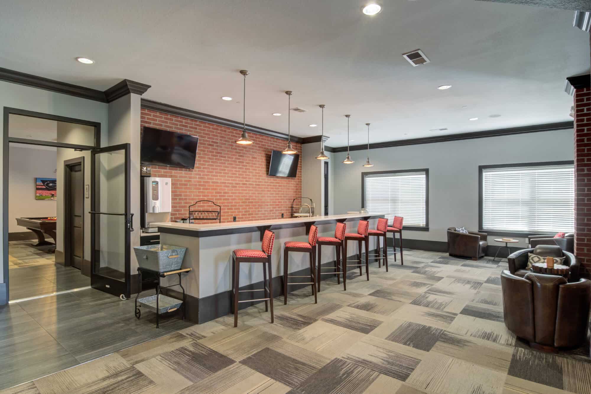 the flats at carrs hill off campus apartments near the university of georgia athens resident clubhouse lounge kitchen event space